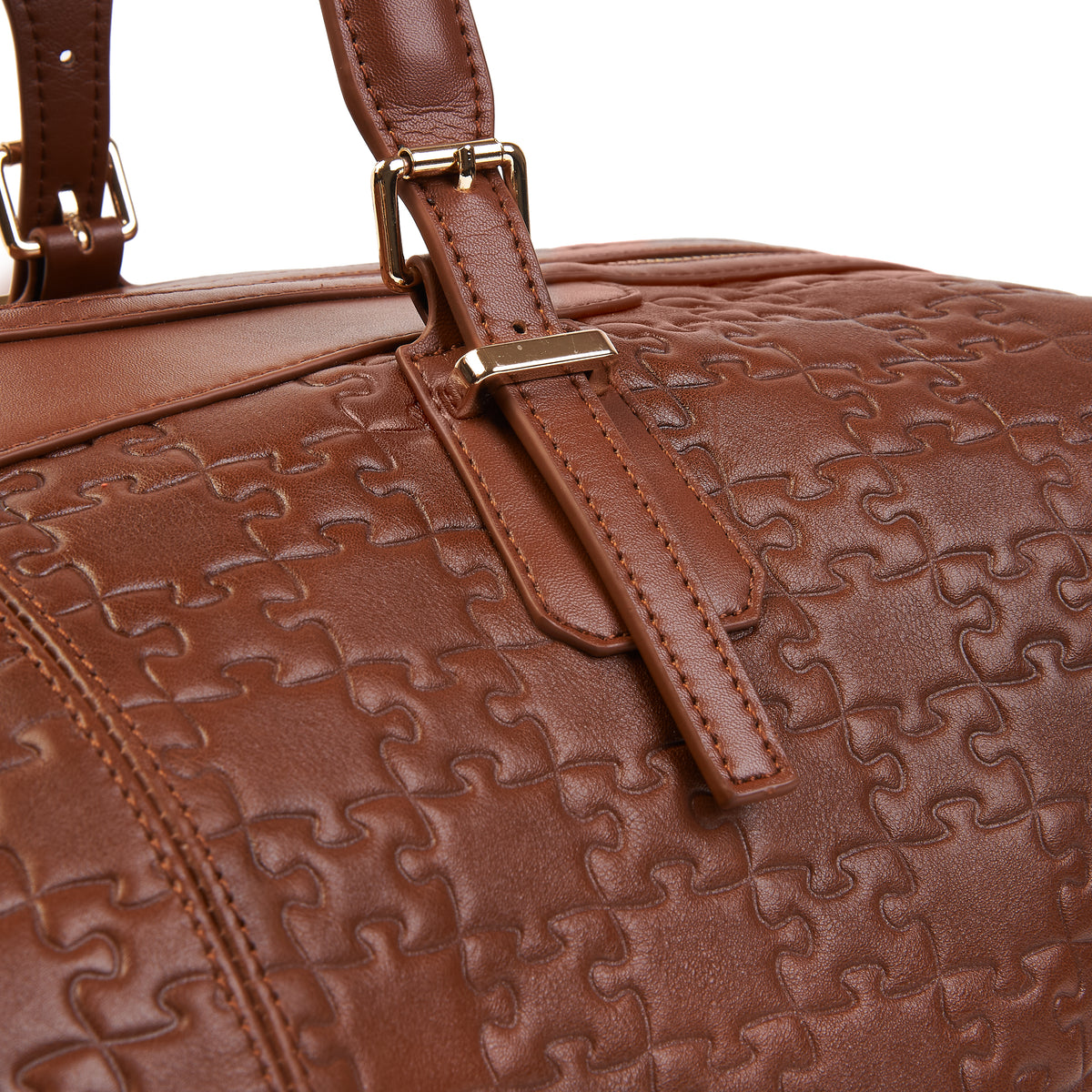 The Abimbola Jigsaw Duffle Bag — Brown Waxed — top strap detail