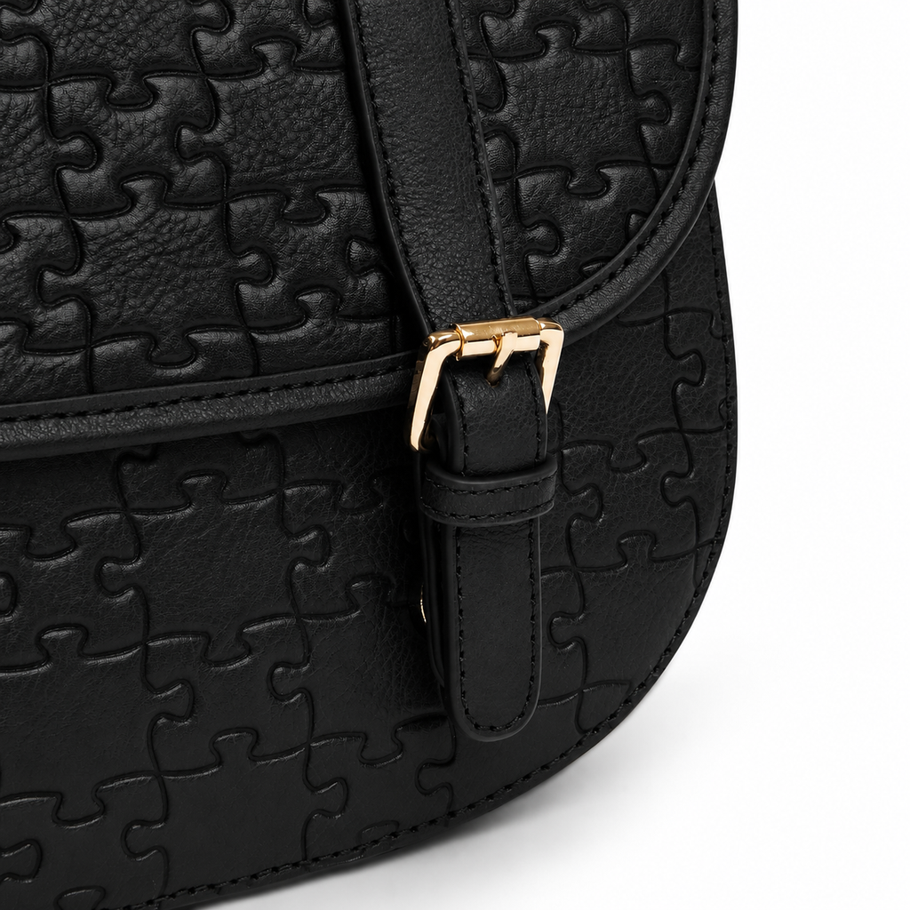 The Aremu Messenger — Black Lychee — buckle detail