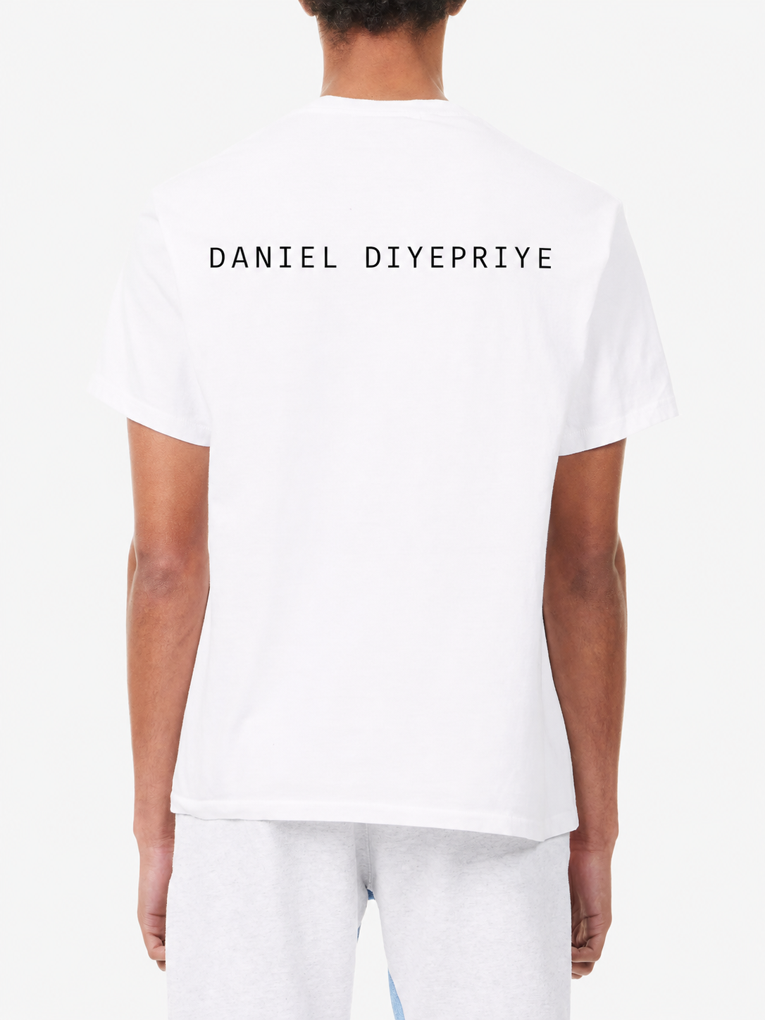 The Heavens Calling Tee · white · back · DANIEL DIYEPRIYE wordmark