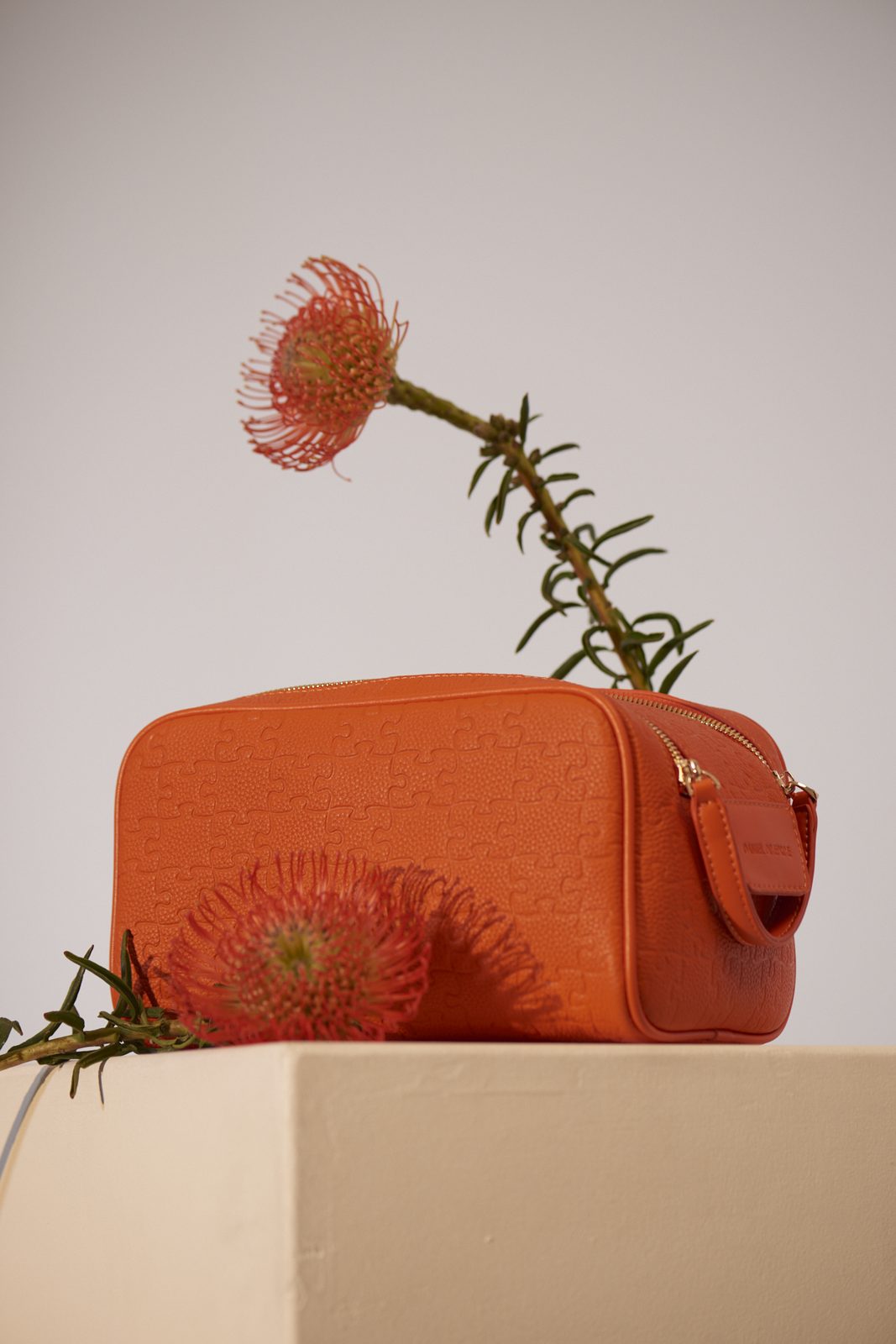 The Travel Set · Orange · editorial still-life