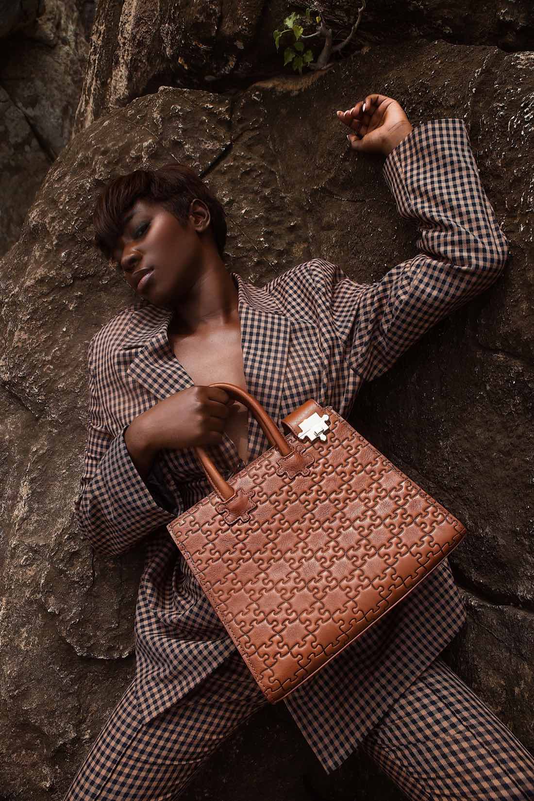 Daniel Diyepriye original Nkari campaign on the rocks