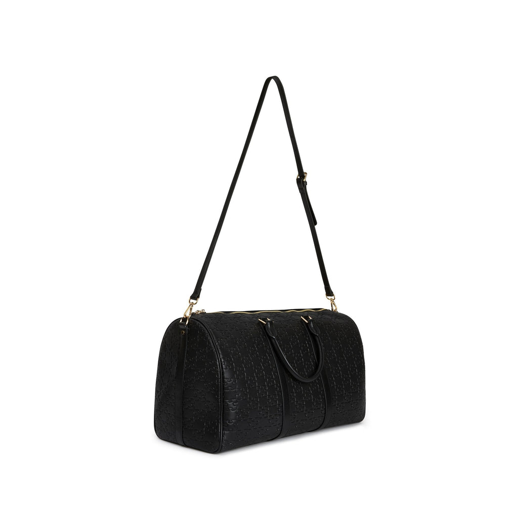 The Abimbola Jigsaw Duffle Bag — strap
