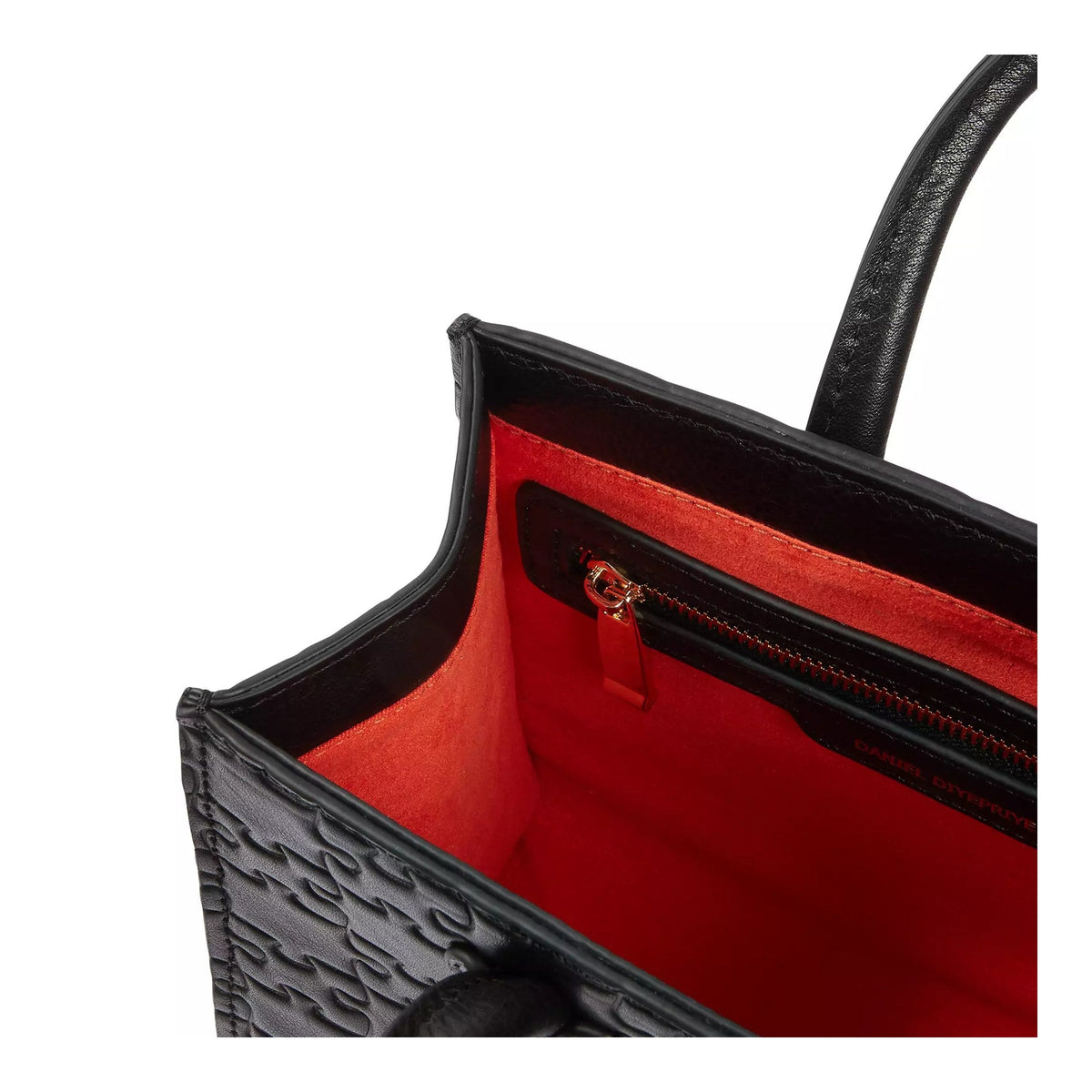 The Temitope D Mini Tote — orange interior