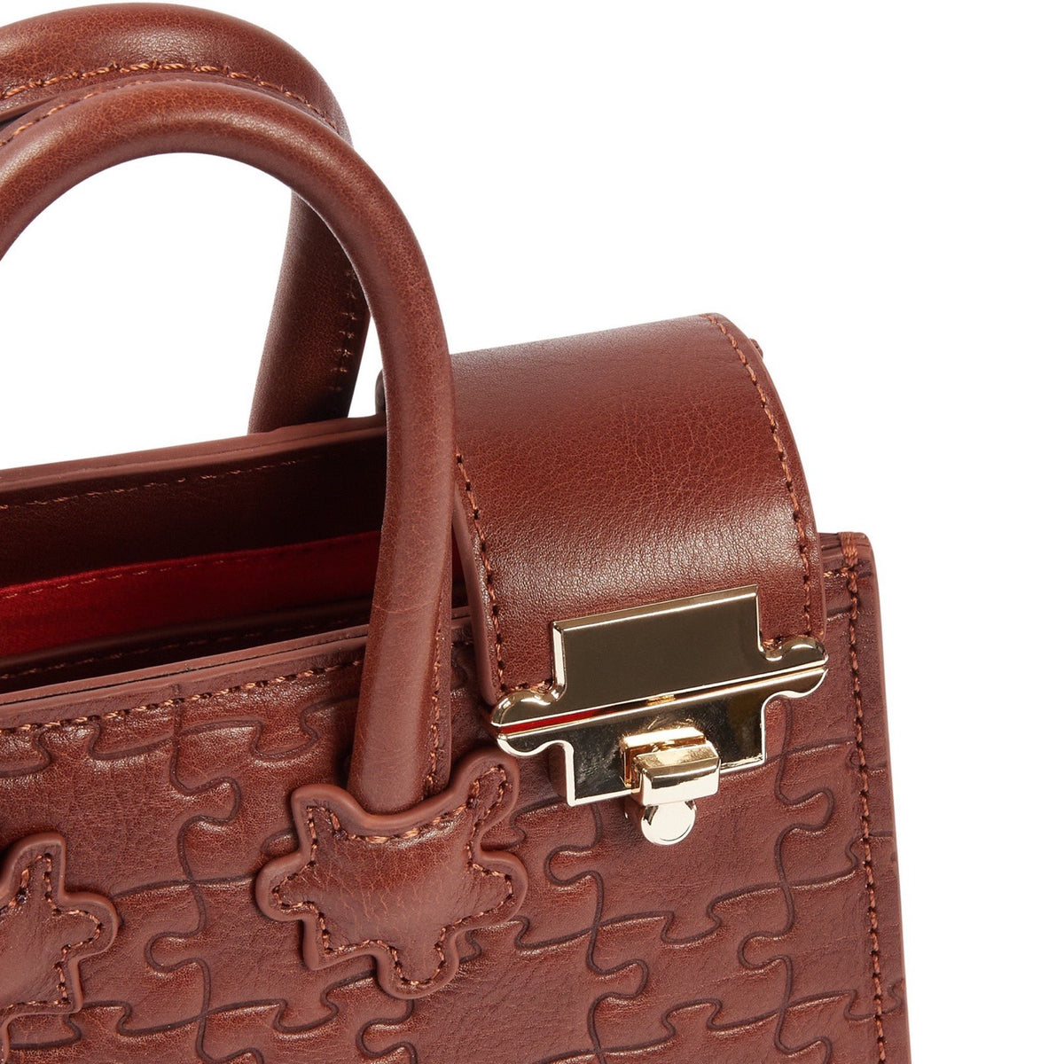 The Ibukun Tiny Tote - Brown Leather hardware detail