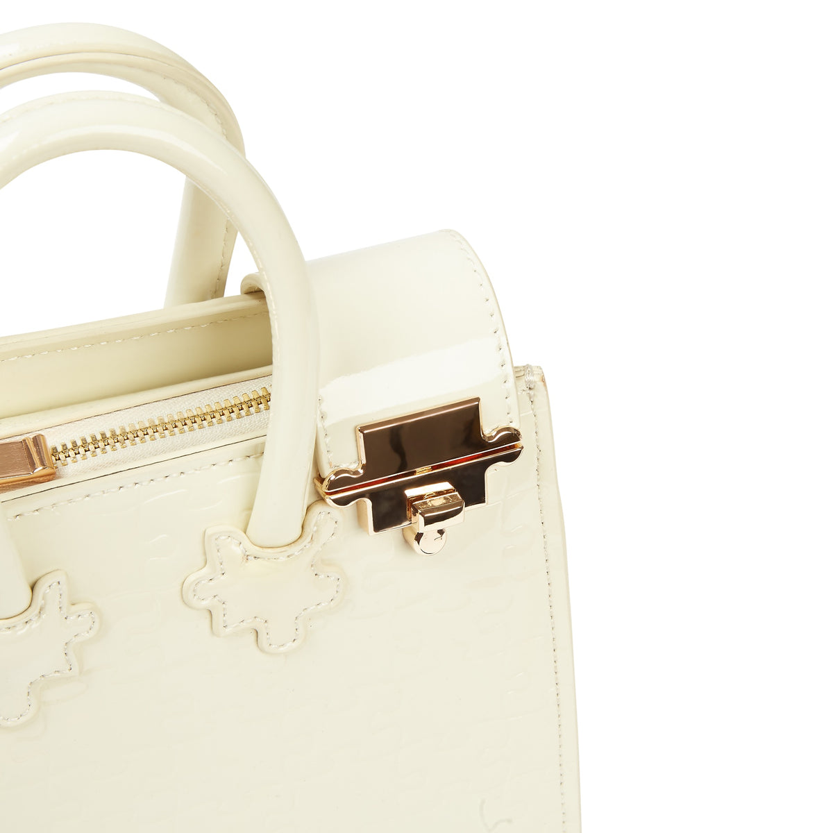 The Ibukun Tiny Tote - Cream Patent hardware detail