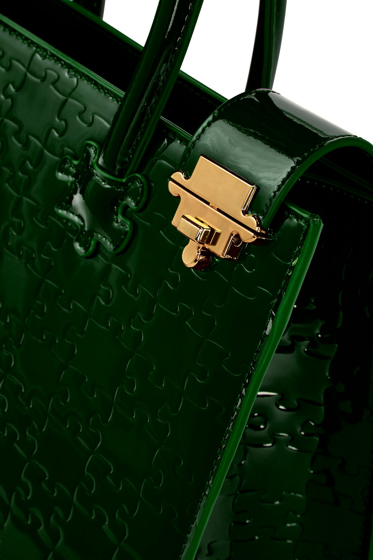 The Ibukun Tote — Forest Green Patent — gold flip-clasp detail