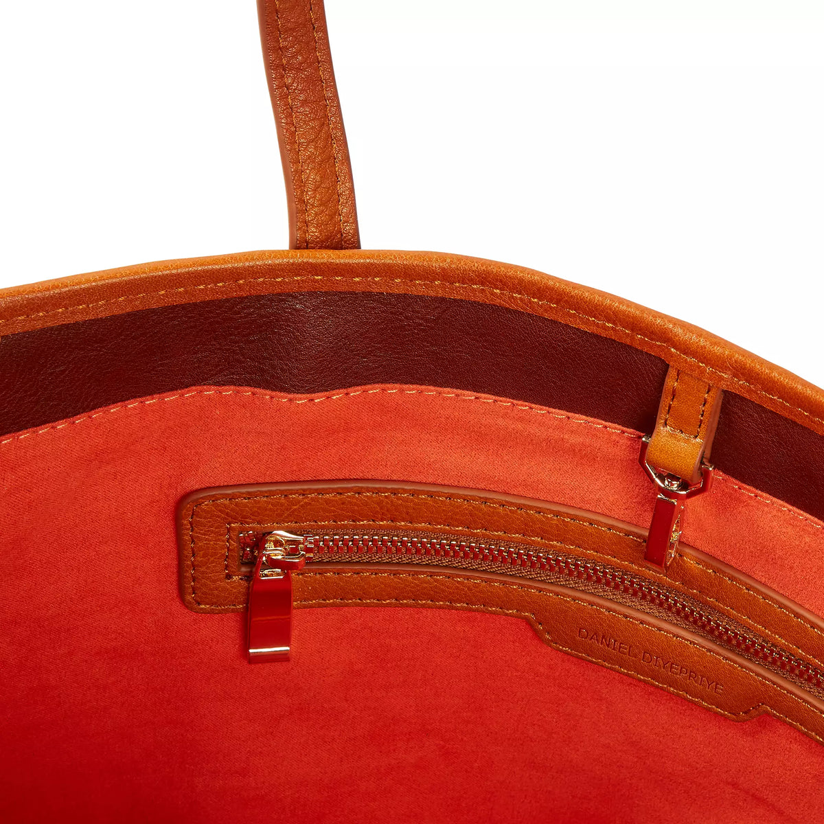 The Nkari Oluwaseun Hopper — interior with orange velvet lining + gold zip