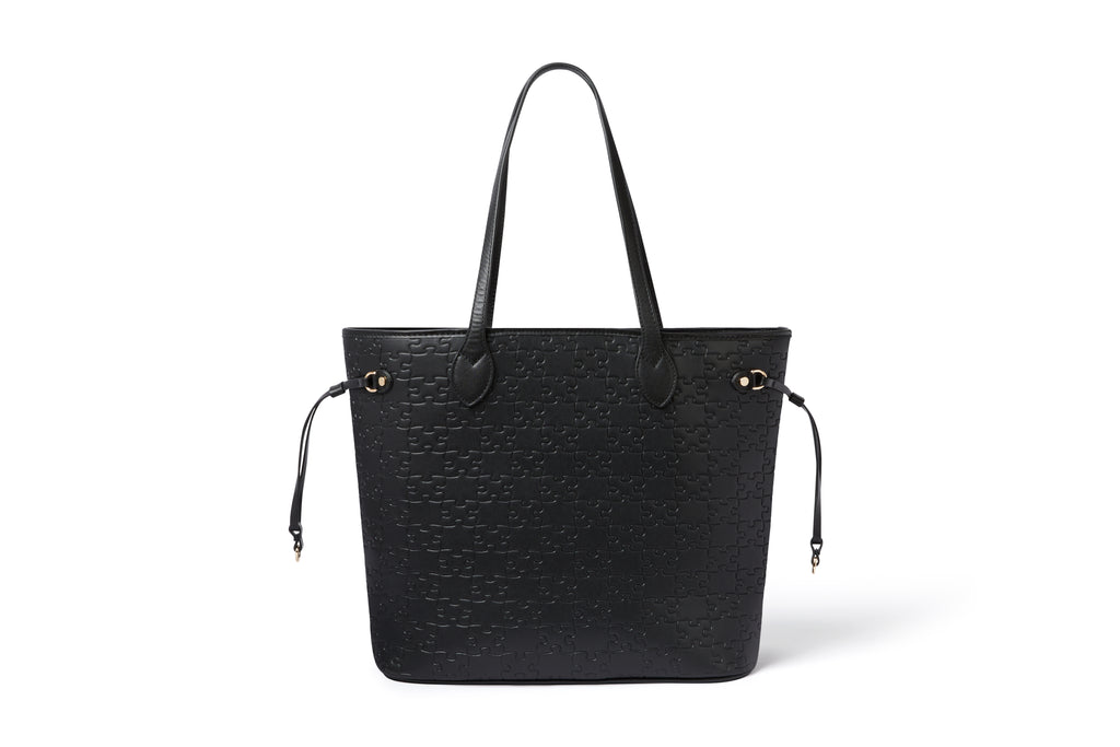 The Nkari Oluwaseun Hopper — Black jigsaw embossed waxed leather — front