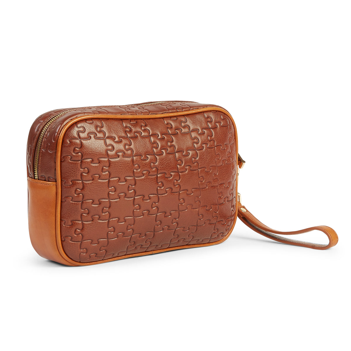 The Nkari Titilope Washbag — Nkari waxed brown jigsaw embossed leather — side