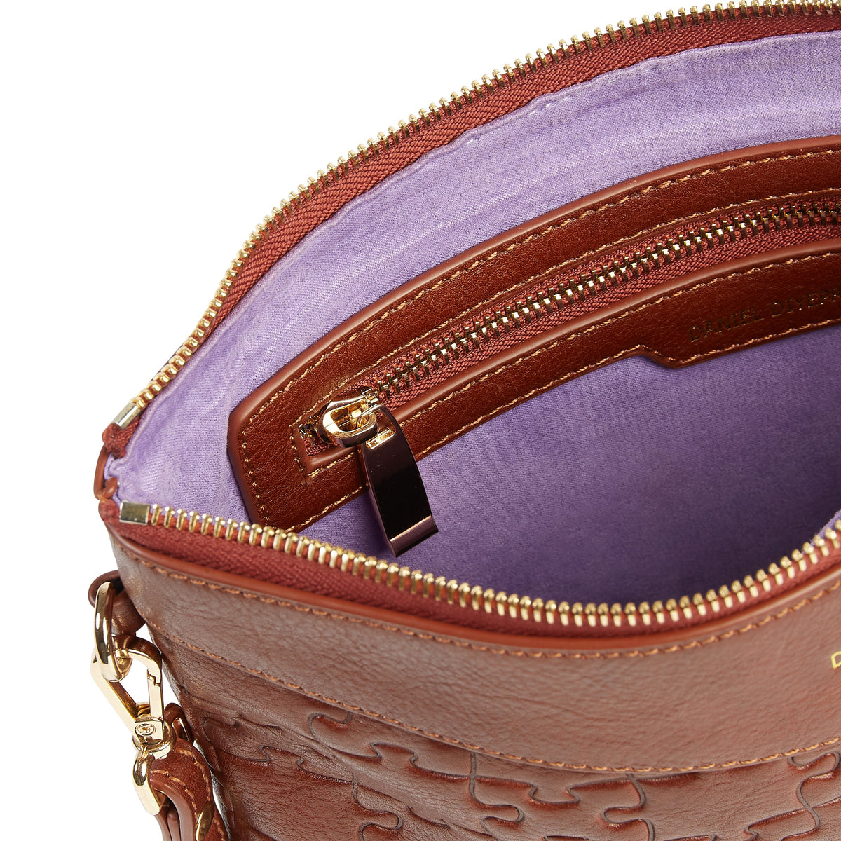 Tomiwa Jigsaw Clutch Nkari — main