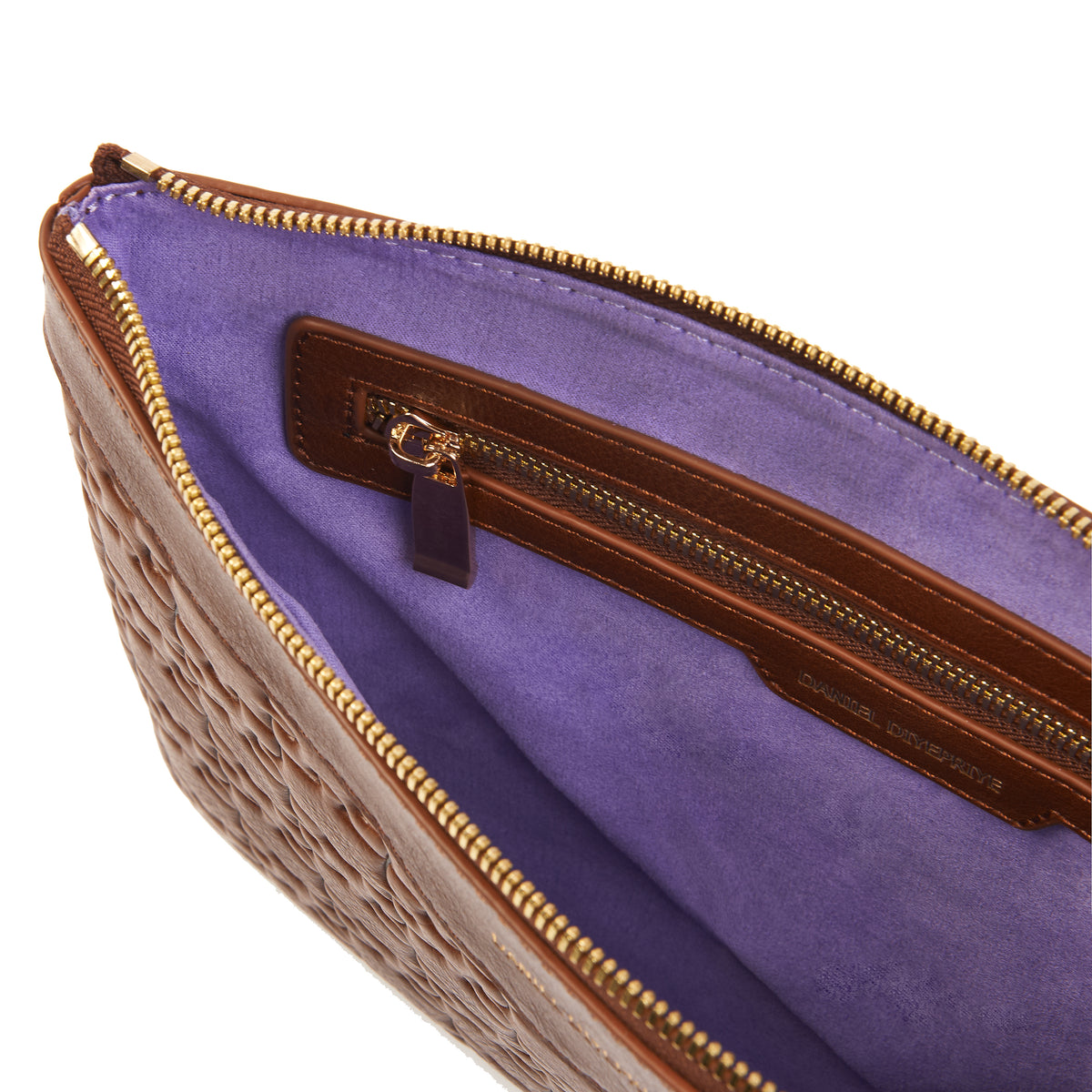 The Tomiwa Jigsaw Clutch — Nkari — interior with purple suede lining and DD-branded zip