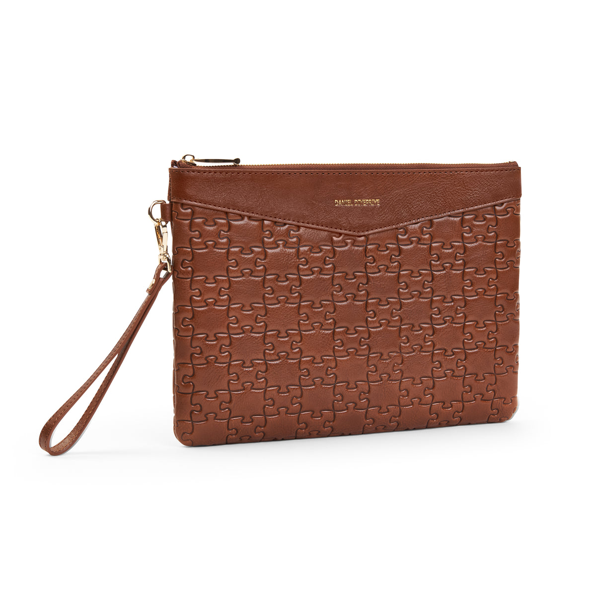 The Tomiwa Jigsaw Clutch — Nkari — front angle with wristlet strap